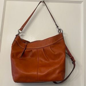 Burnt Orange Coach purse with matching wallet